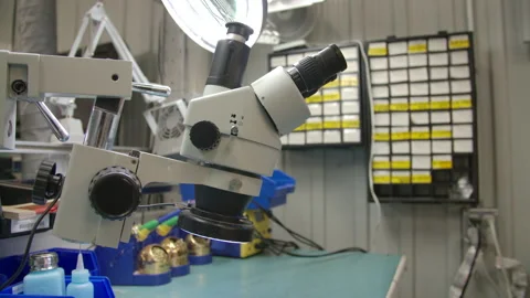 Manufacturing electronics chips in factory - Microscope in fabrication Video stock 184026708