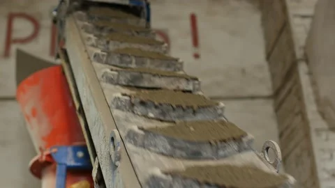 Manufacturing phase of segmental concrete pavers for surface covering Stock Footage 95233676