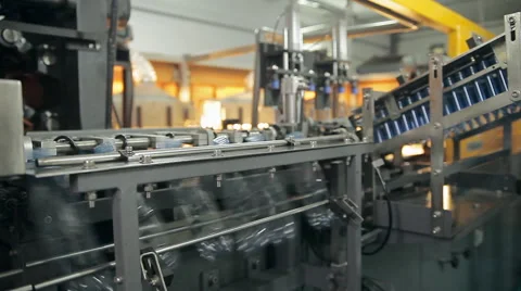 A manufacturing of plastic bottles for water Stock Footage 63230855