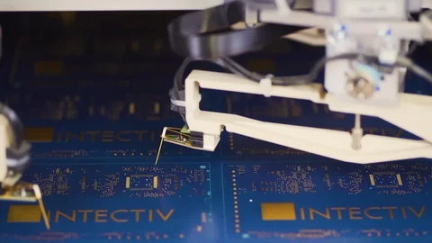 Manufacturing printed circuit board, PCB with robot machine, close up shot. Stock Footage 121150880