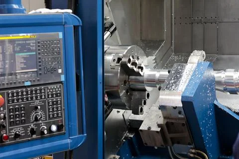 Manufacturing process on metalworking CNC machine Stock Photos