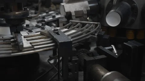 Manufacturing process of paper cup for coffee or tea. Rotating machine parts. Stock Footage 92670547
