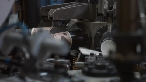 Manufacturing process of paper cup for coffee to go. Rotating machine parts. Stock Footage 92677601