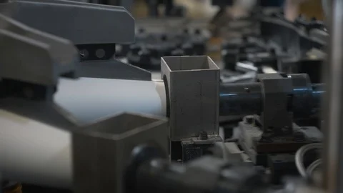 Manufacturing process of paper cup for coffee or tea. Rotating machine parts. Stock Footage 92727883