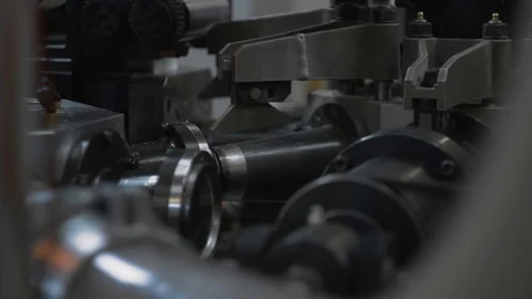 Manufacturing process of paper cups for coffee or tea. Rotating machine parts. Stock Footage 92685188