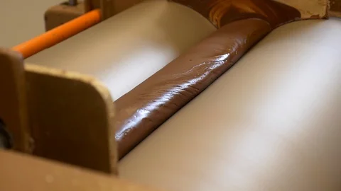 The manufacturing of small-batch chocolate using the three-role refiner. Stock Footage 100646701