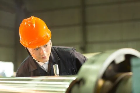 Manufacturing worker working in workshop Stock Photos