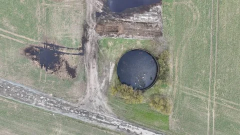 Manure storage tank lagoon pit submerged slurry collect and store 스톡 동영상 331078378