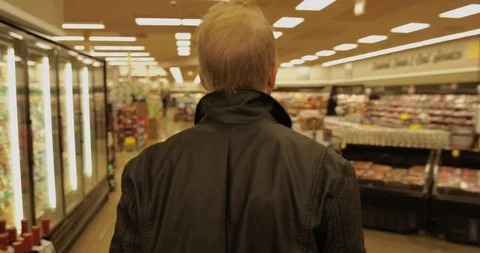 ManWalkingInGroceryStore Stock Footage 88838481