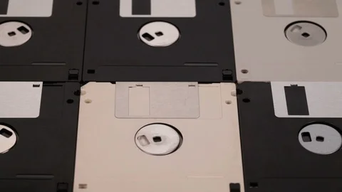 Many 3.5 inch computer floppy disks arranged on a flat surface Stock-Footage 90645365