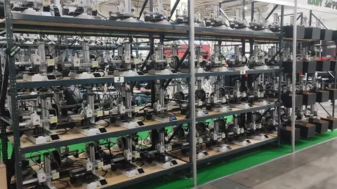 Many 3D printers printing an object. 3D printers simultaneously printing model Stock-Footage 320827490