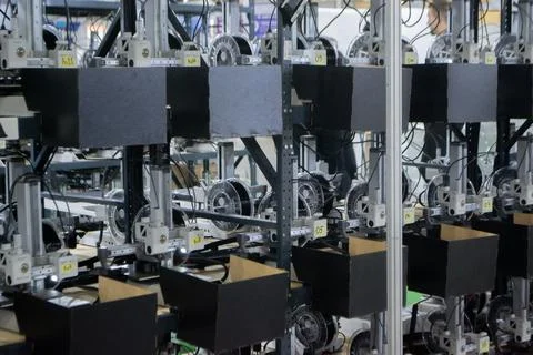 Many 3D printers printing an object. 3D printers simultaneously printing model Stock Photos