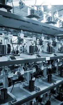 Many 3D printers printing object. 3D printers creating shape from molten plastic Stock Photos