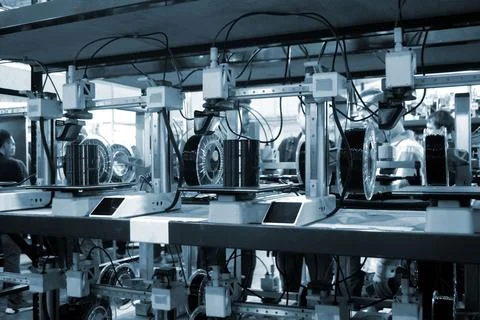Many 3D printers printing object. 3D printers creating shape from molten plastic 스톡 사진