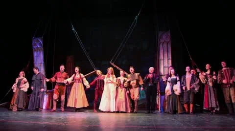 Many actors sing and clap during musical - Francois Villon Stock Footage 22010911