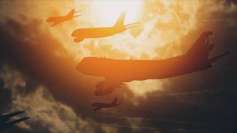 Many Airliners In The Sky In Front Of The Sun Stock Photos