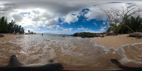 Many amazing waves breaking gently underneath the camera lens in Hawai'i Stock Footage 109497165
