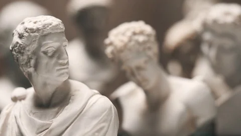 Many Ancient Roman Statues Figures - Focus Pull Between Them Stock Footage 90189988