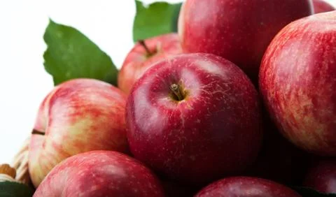 Many apples in the basket close up Stock Photos