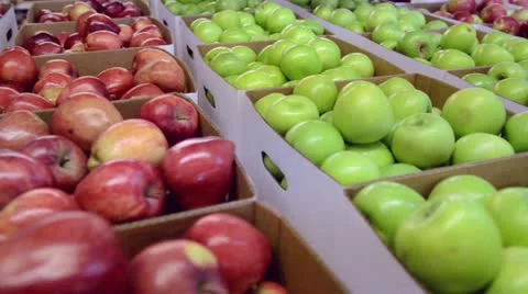 Many apples in a boxes in market Stock Footage