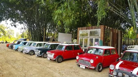 Many Austin Mini cooper or classic car parked on street Stock Photos