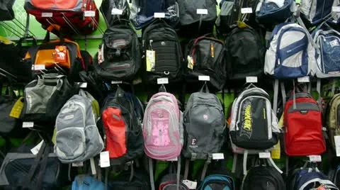 Many backpack on the counter at mall. Видео 8982981