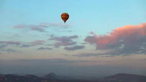 Many balloons flying over the valleys in Goreme, Turkey. Stock Footage 157690306
