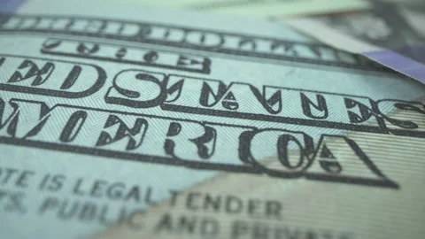 Many banknotes rotate on the table close up. Banking and commercial activity Video stock 141709489