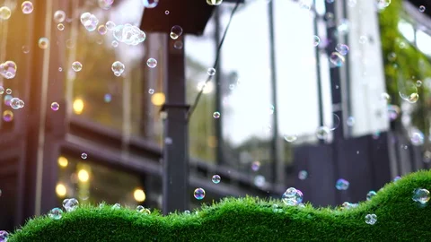 Many beautiful bubbles are emanating from the bubble maker. Stock Footage 107098791
