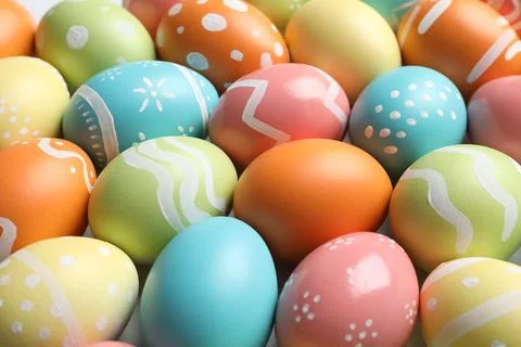 Many beautiful painted Easter eggs as background, closeup Stock Photos