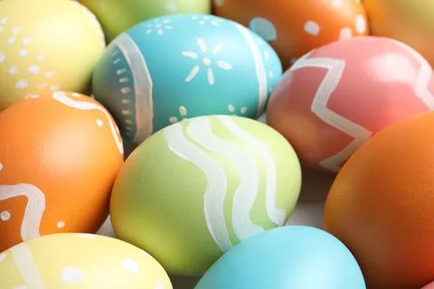 Many beautiful painted Easter eggs as background, closeup Stock Photos