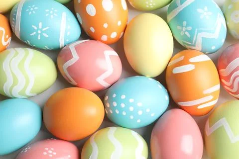 Many beautiful painted Easter eggs as background, top view Foto stock