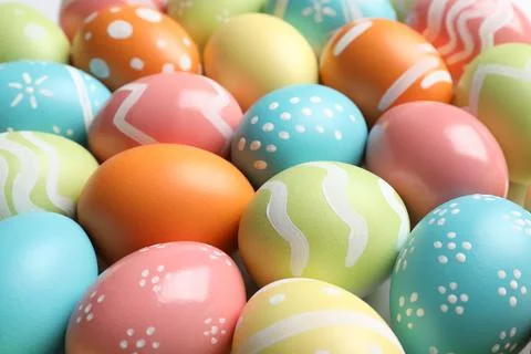 Many beautiful painted Easter eggs as background, closeup 스톡 사진