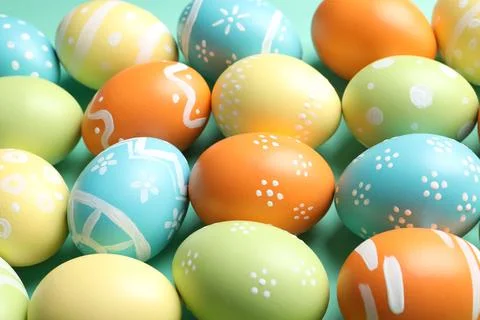 Many beautiful painted Easter eggs as background, closeup Stock Photos