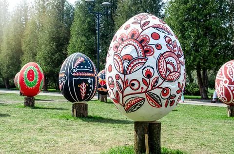 Many big Easter eggs in the park. Stock Photos