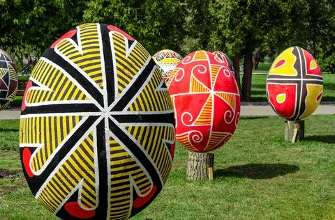 Many big Easter eggs in the park. Stock Photos