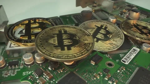 Many Bitcoins on the electronic chip. BTC macro shot. Blockchain technology Stock Footage 143635239