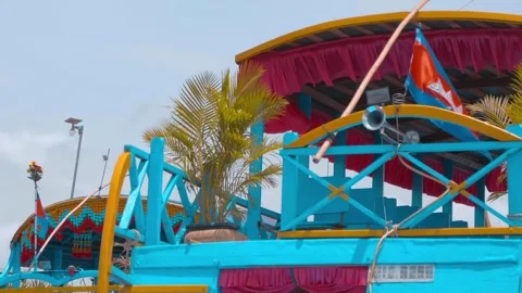 Many of blue single and double decker tourist boats are moored to the shore  Stock Footage 305751086