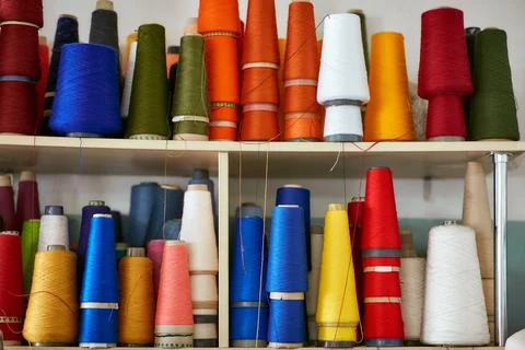 Many bobbins with knitting threads Stock Photos
