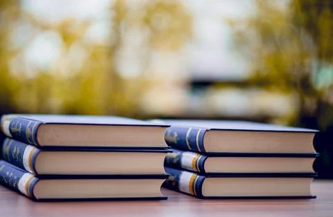 Many books are placed on the table, school supplies. Education concept Stock Photos