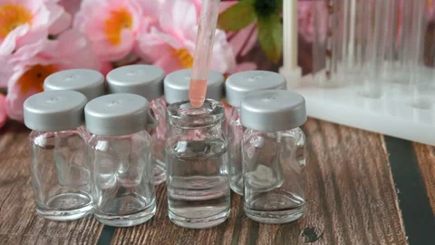 Many bootles with essential oils blend. Aroma liquids and perfume making. Dro 库存影片 145974395