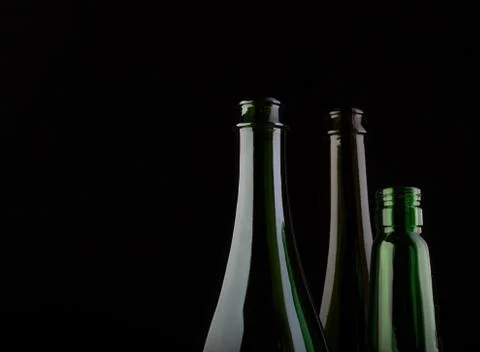Many bottles on black background studio shot Foto stock
