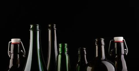 Many bottles on black background studio shot 스톡 사진