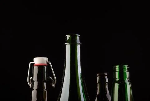 Many bottles on black background studio shot 스톡 사진