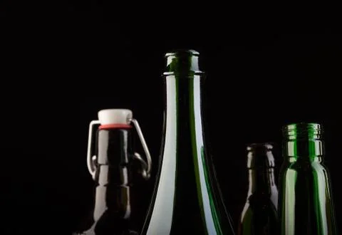Many bottles on black background studio shot 스톡 사진
