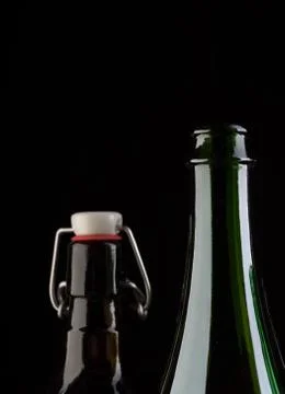 Many bottles on black background studio shot Foto stock