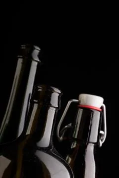 Many bottles on black background studio shot 스톡 사진