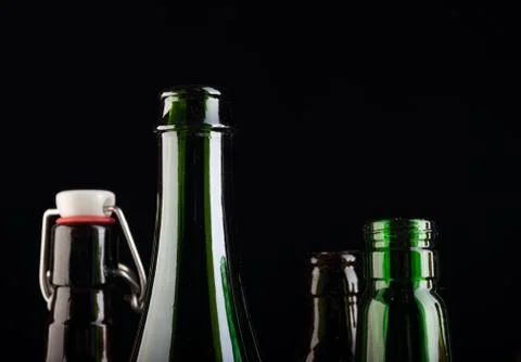 Many bottles on black background studio shot 스톡 사진