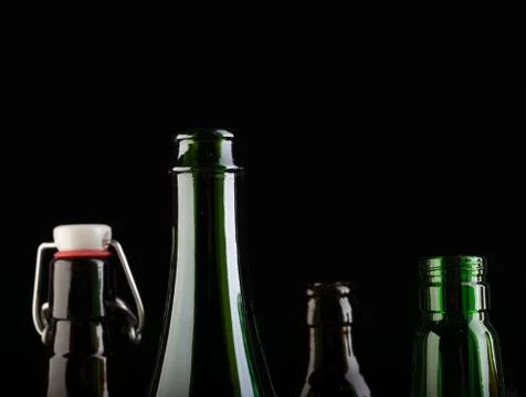 Many bottles on black background studio shot Foto stock