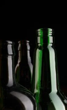 Many bottles on black background studio shot 스톡 사진